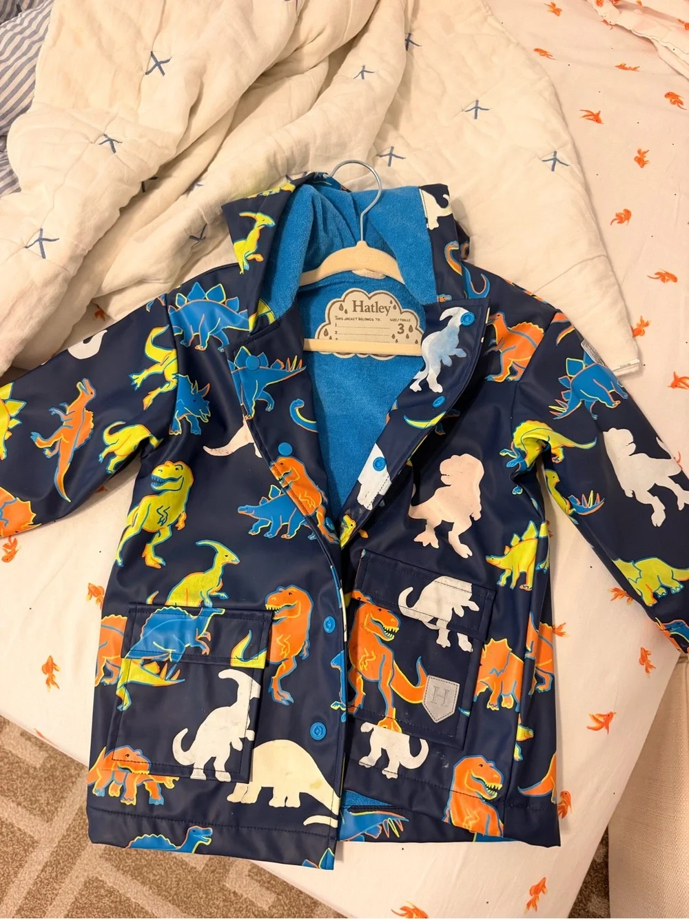 Hatley Navy Dinosaur Print Kids Raincoat with Bright Multicolor Dinos